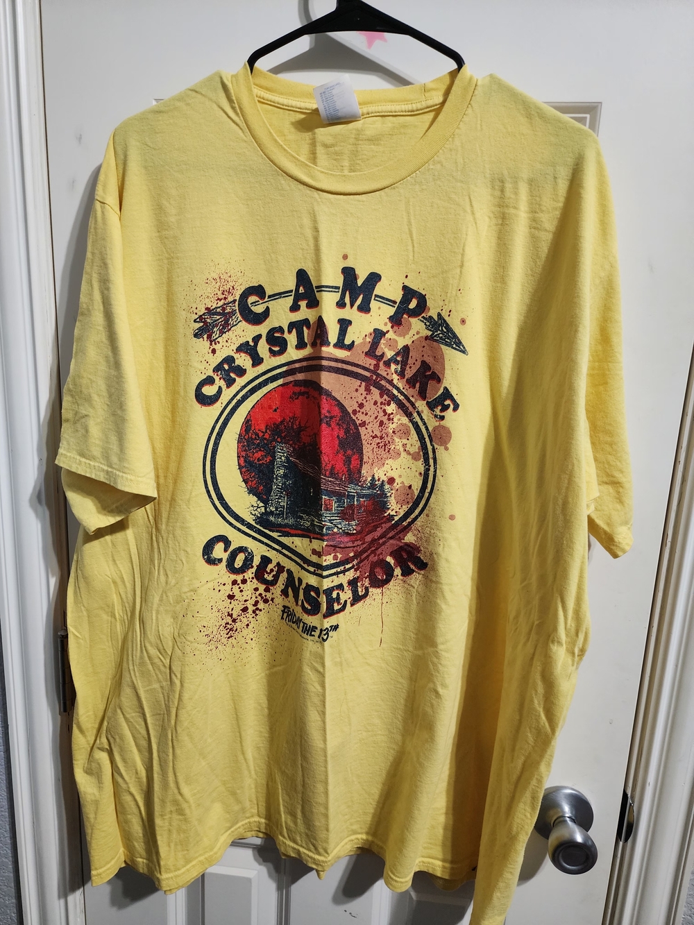 Camp Crystal Lake Counselor Graphic Tee - Yellow with Red/Black Print